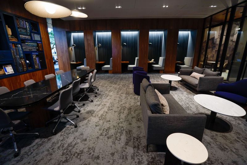 The Centurion Lounge at Hartsfield-Jackson International Airport has booths, private workspaces and a conference table.
Miguel Martinez /miguel.martinezjimenez@ajc.com