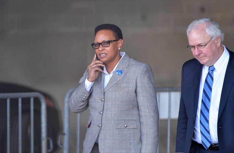 Rev. Mitzi Bickers and her attorney Richard Hendrix emerge from the Richard B. Russell Federal Building after her first appearance in federal court on Thursday, April 5, 2018, on bribery charges. She face charges that she took $2 million in bribes to steer city of Atlanta contracts to at least two contractors from 2010 to 2015. She was released on a $50,000 appearance bond. HYOSUB SHIN / HSHIN@AJC.COM