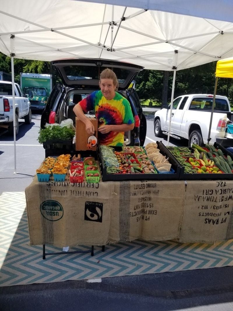 Rob Miller of Trefoil Gardens sells vegetables, foraged mushrooms and herbs at Roswell’s Sweet Apple Farmers Market. CONTRIBUTED BY BARBARA MATHIS