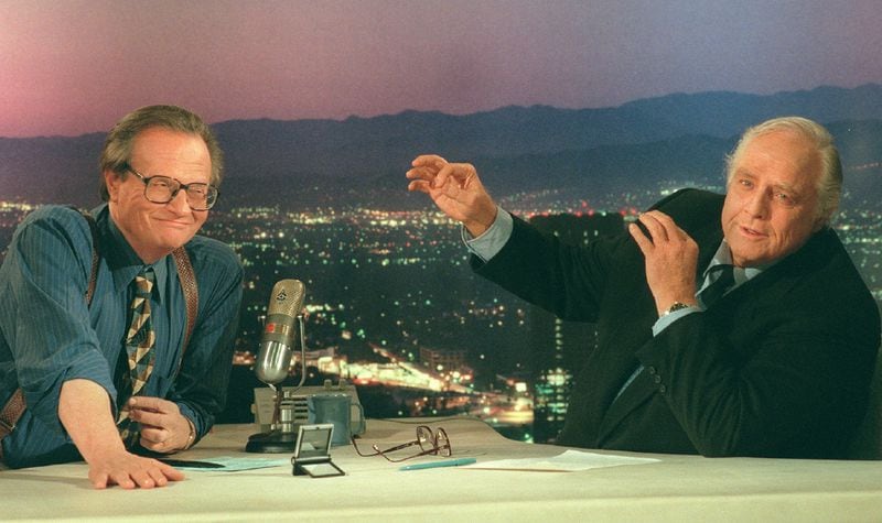 Marlon Brando, right, gestures while talking with Larry King during a break in the taping of CNN's 'Larry King Live' in Los Angeles, Friday, April 5, 1996. Brando denied his opinions are anti-Semitic, but militant and mainstream Jewish leaders said his comments about Jews controlling Hollywood were 'sloppy' and shameful. (AP Photo/Larry King Live, Danny Feld)