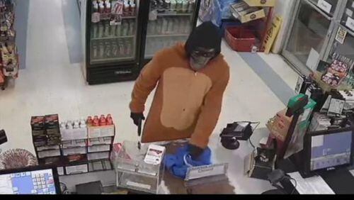 Video cameras caught a suspect wearing a mask and an animal onesie.