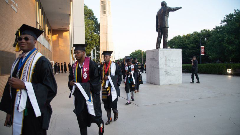 Graduates line up before the start of the Morehouse College graduation ceremony in Atlanta, Sunday, May 19, 2019. STEVE SCHAEFER / SPECIAL TO THE AJC