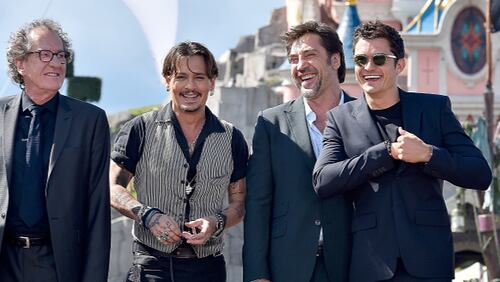 Actors, from left, Geoffrey Rush, Johnny Depp, Javier Bardem and Orlando Bloom attend the European premiere of Disney's ‘Pirates of the Caribbean: Dead Men Tell No Tales.’  Depp and Bardem have both signed on to play monsters in Universal’s new ‘Dark Universe’ film series, a reboot of sorts of classic monster movies.