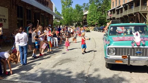 This parade in Serenbe has a small-town feel with decorated floats, walking musicians and the city fire truck.
Courtesy of Serenbe.