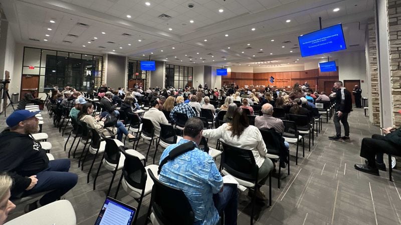 A large crowd gathered at the Cherokee County school board meeting on Feb. 15, 2024. The board voted 4-3 to hire Mary Elizabeth Davis as its next superintendent. Davis is currently the superintendent of Henry County's school district. (Atlanta Journal-Constitution/Jason Allen)