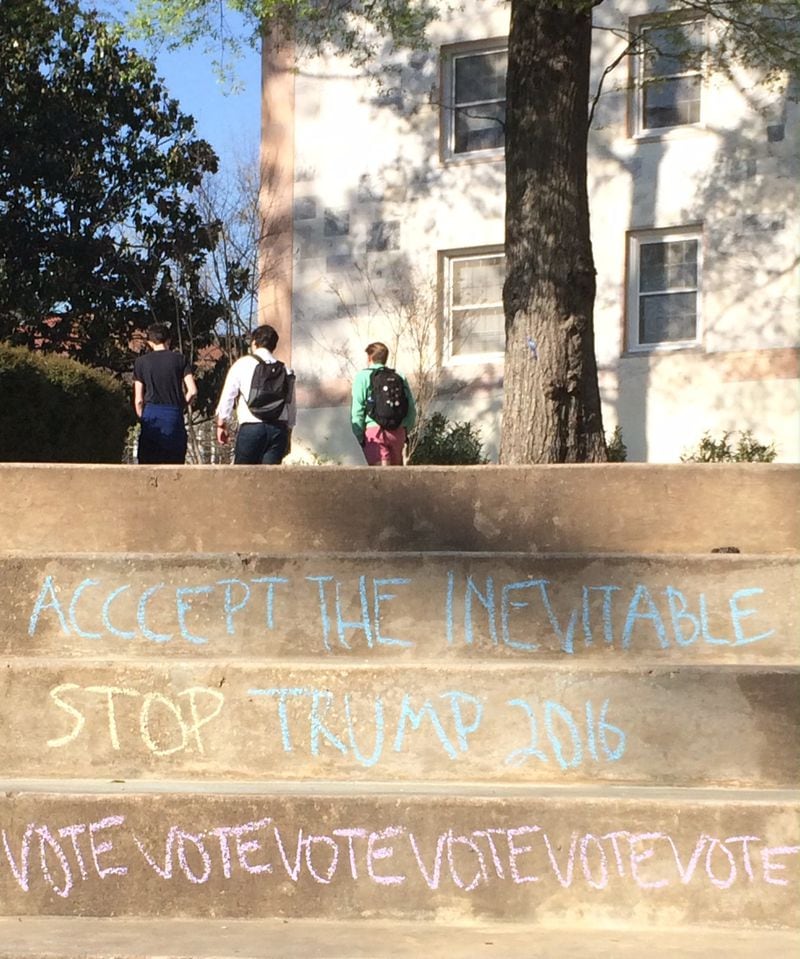 A serial chalker in support of Donald Trump put Emory University in the news. A Trump opponent apparently added “STOP” in front of “TRUMP 2016.” And, yes, the first word in the chalk message is misspelled. Photo by AJC’s Bill Torpy