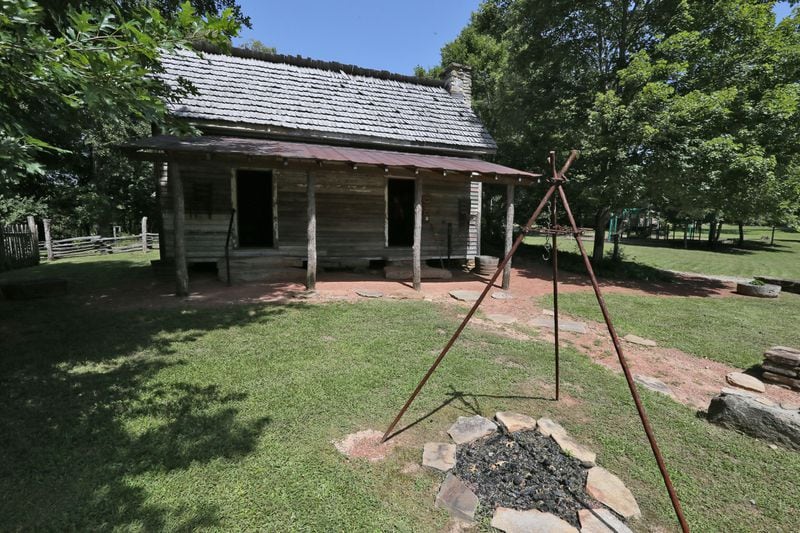 Sautee Nacoochee “African American Heritage Site”: The one-room cabin continued to be lived in through the decades and had several rooms added on, which had since rotted away. It had most recently been used as a storage shed. After its restoration, the cabin was moved to a new location. (BOB ANDRES / BANDRES@AJC.COM)