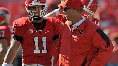 Georgia coach Mike Bobo has earned a reputation as one of the best coordinators in the business when it comes to developing quarterbacks, such as former Bulldog Aaron Murray. (AJC photo by Brant Sanderlin)