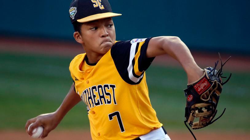 Peachtree City, Georgia's Tai Peete delivers in the first inning against Staten Island (N.Y.) at the Little League World Series baseball tournament in South Williamsport, Pa., Thursday, Aug. 23, 2018. (AP Photo/Gene J. Puskar)