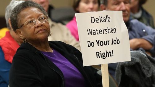 DeKalb County resident Arelia Wimby was on hand with dozens of other area residents to demand answers about excessively high water bills during a town hall meeting at the Maloof Auditorium in Decatur on Nov. 10, 2016. Curtis Compton/ccompton@ajc.com