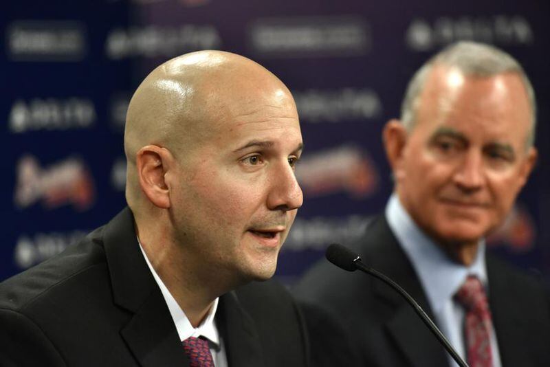  John Coppolella (left) was forced to resign as Braves general manager last week, and president of baseball operations John Hart (right) is serving as GM until a replacement is hired. (Hyosub Shin/AJC file photo)