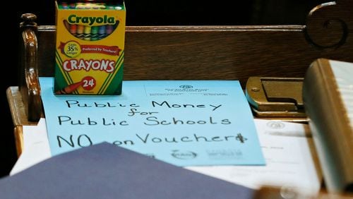 A south Georgia student says school vouchers will not help his rural community and will divert state dollars from public education.  ( Bob Andres/AJC)