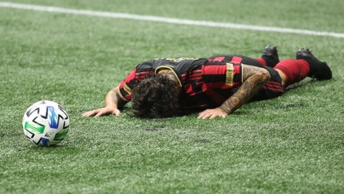Atlanta United defender Franco Escobar (2) lays on the ground during the first half in a MLS game against the  New York Red Bulls at Mercedes-Benz Stadium on Saturday, Oct. 10, 2020, in Atlanta. Branden Camp/For the Atlanta Journal-Constitution