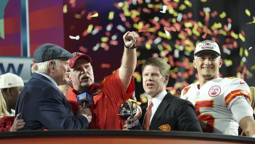 Kansas City Chiefs head coach Andy Reid, owner Clark Hunt and quarterback Patrick Mahomes celebrate after winning the Super Bowl LVII against Philadelphia Eagles at State Farm Stadium in Glendale, Ariz., on Feb. 12, 2023. (Doug Mills/The New York Times)