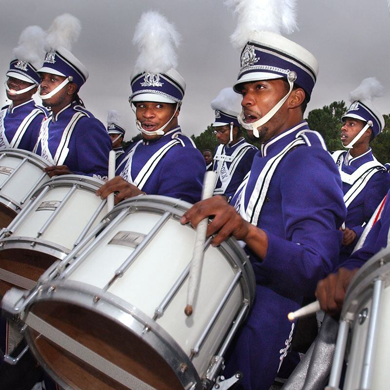 Members of the Morris Brown University marching band drumline get ready to perform at the premiere of the movie, 'Drumline' in 2002. (RICH ADDICKS / AJC file)