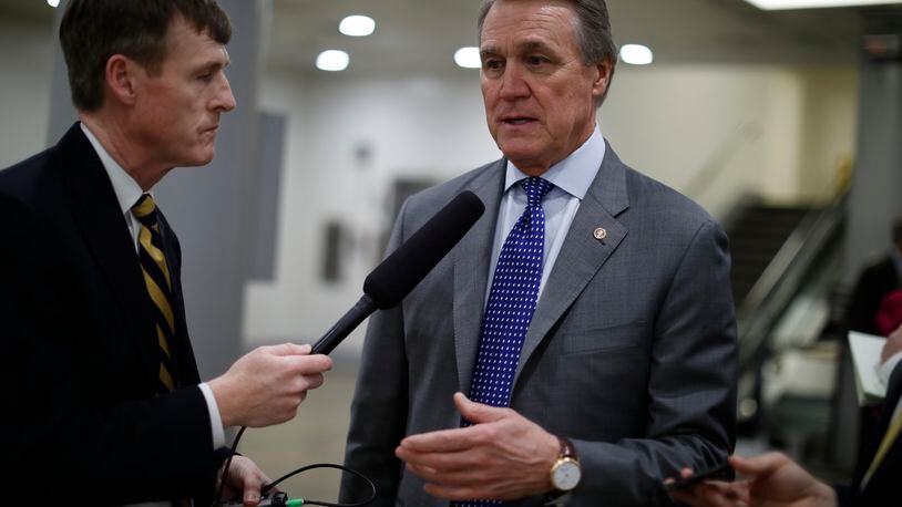 WASHINGTON, DC - FEBRUARY 15: Sen. David Perdue (R-GA) speaks with reporters on Capitol Hill on February 15, 2018 in Washington, DC. The Senate failed to pass an immigration fix, raising questions about the fate of DACA recipients. (Photo by Aaron P. Bernstein/Getty Images)