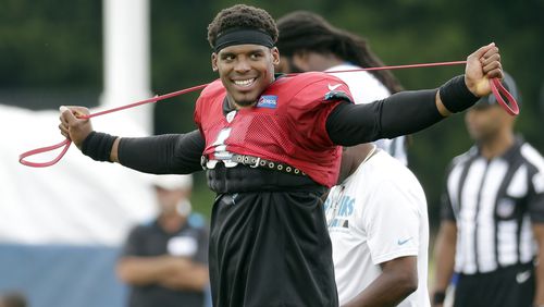 Carolina Panthers' Cam Newton (1) stretches during practice at the NFL team's football training camp at Wofford College in Spartanburg, S.C., Wednesday, Aug. 2, 2017. (AP Photo/Chuck Burton)
