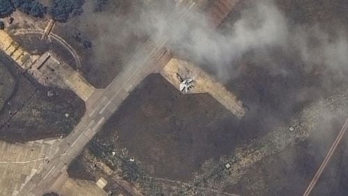 This image released by Maxar Technologies shows a damaged plane, likely a MiG 31 fighter aircraft, at Belbek air base, near Sevastopol, in Crimea, Thursday, May 16, 2024. (Satellite image ©2024 Maxar Technologies via AP)