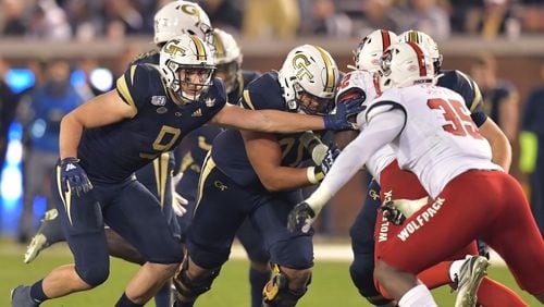 Georgia Tech tight end Tyler Davis (9) and Georgia Tech offensive lineman Jared Southers (70) during the first half of an NCAA college football game at Bobby Dodd Stadium on Thursday, November 21, 2019. (Hyosub Shin / Hyosub.Shin@ajc.com) (**EDNOTE: for future story of Tyler Davis and Jared Southers)