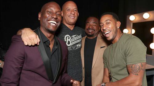 "Fate of the Furious" stars Tyrese Gibson, Vin Diesel and Ludacris join director F. Gary Gray at a promotional event. Photo: CinemaCon