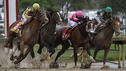 Thoroughbred racing, one gambling option supporters have pushed in Georgia, has been in decline. Alexander Waldrop, the president and CEO of the National Thoroughbred Racing Association, said it was a $16 billion industry in 2009 but is now down to $11 billion. (AP Photo/John Minchillo, File)