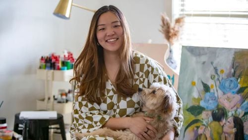 Nicole Kang in her home studio with her dog Otis. (Photo Courtesy of Isadora Pennington)
