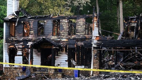 Investigators are working to determine the cause of the fire at the home in Roswell.