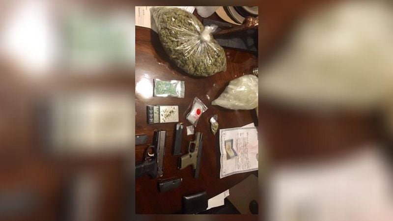 Drugs and firearms were reportedly found at Brown's home. (Credit: Clayton County Sheriff's Office)