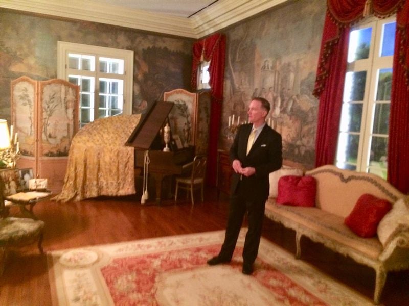 Rodney Mims Cook Jr. in the life-size replica of the parlor of the Pink Palace at his Millennium Gate Museum. Photo by Bill Torpy