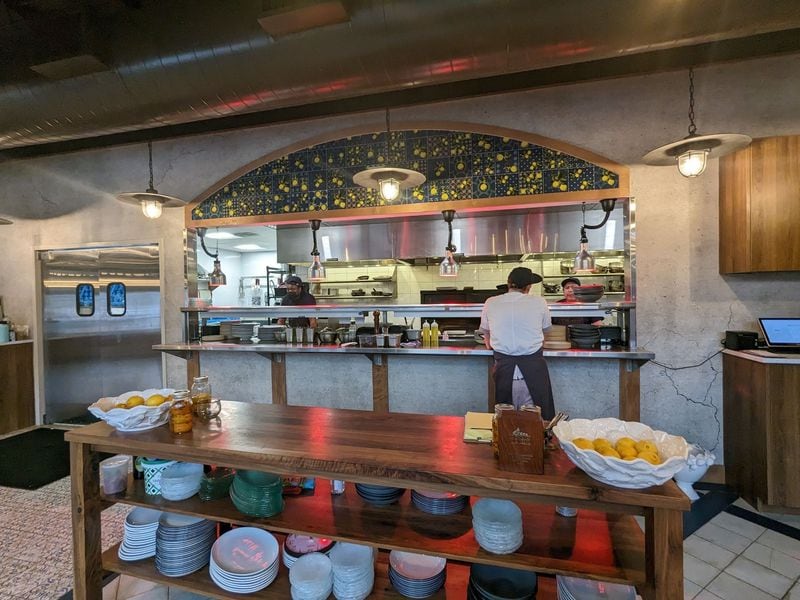 Upon entering Alici, guests get a glimpse of the kitchen, where dishes inspired by Italy's Amalfi Coast are prepared. Courtesy of Paula Pontes 