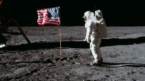 Astronuat Buzz Aldrin salutes the deployed United States flag on the moon’s surface during the Apollo 11 mission to the moon in July of 1969. President Donald Trump signed a directive Monday to send astronauts back to the moon.