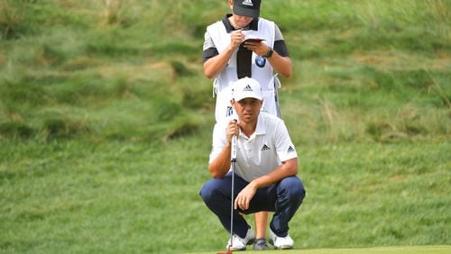 Looking for answers on the greens Friday at the BMW Championship, Xander Schauffele mostly found them. (Drew Hallowell/Getty Images)
