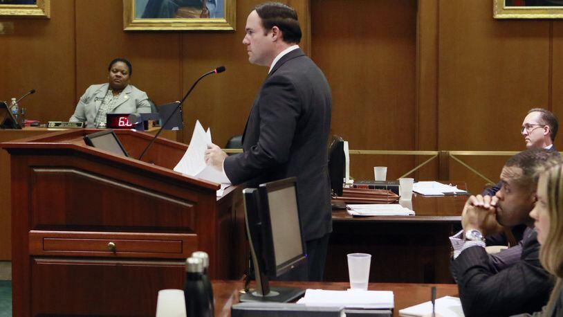 Alex Sponseller argues for the state Monday in the Georgia Supreme Court case involving the tax-credit scholarship. In the $58 million, K-12 program, taxpayers pledge money to specific private schools and get a tax credit. The money goes indirectly to schools, including religious schools, through nonprofit scholarship organizations that collect the donations. BOB ANDRES /BANDRES@AJC.COM