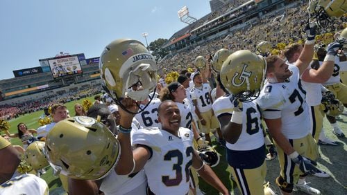 September 9, 2017 Atlanta - Georgia Tech players celebrate their victory over the Jacksonville State during the Georgia Tech home opener at Bobby Dodd Stadium on Saturday, September 9, 2017. Georgia Tech won 37-10 over the Jacksonville State. HYOSUB SHIN / HSHIN@AJC.COM