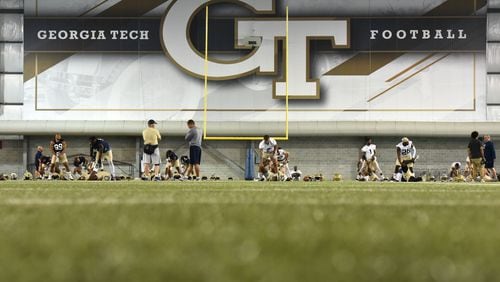 August 4, 2017 Atlanta - Georgia Tech players warm up during the first day of Georgia Tech football practice at Rose Bowl Field in Georgia Tech campus on Friday, August 4, 2017. HYOSUB SHIN / HSHIN@AJC.COM