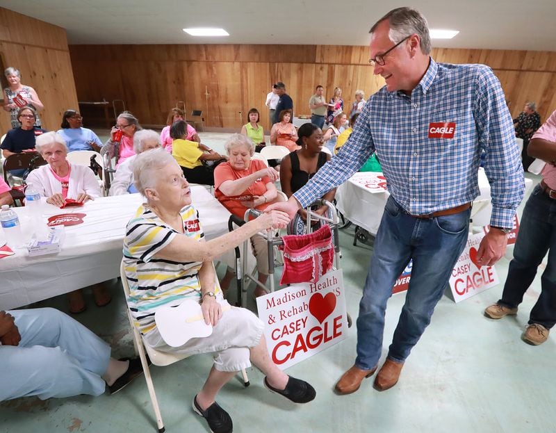 Lt. Gov. Casey Cagle greets supporters from Madison Health and Rehab during a campaign stop at the Madison Lions Club on Sunday, July 22, 2018, in Madison. (Photo: CURTIS COMPTON / ccompton@ajc.com)