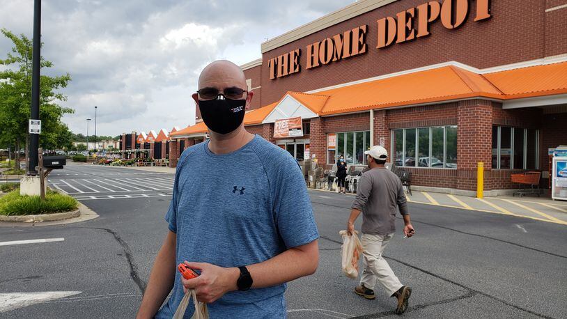Stephen Russell, a customer at a Home Depot in Lilburn, said he likes the idea of local retailers now requiring customers to wear masks in stores during the coronavirus pandemic. He questioned, though, why they don't try harder to enforce their new rules. MATT KEMPNER / AJC