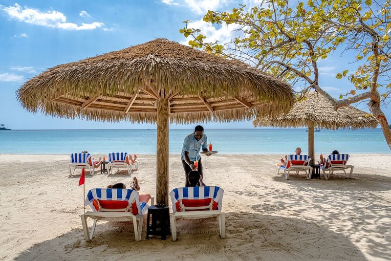 Kick back and be pampered on the pristine beaches of Negril.
(Courtesy of Sunset at the Palms)