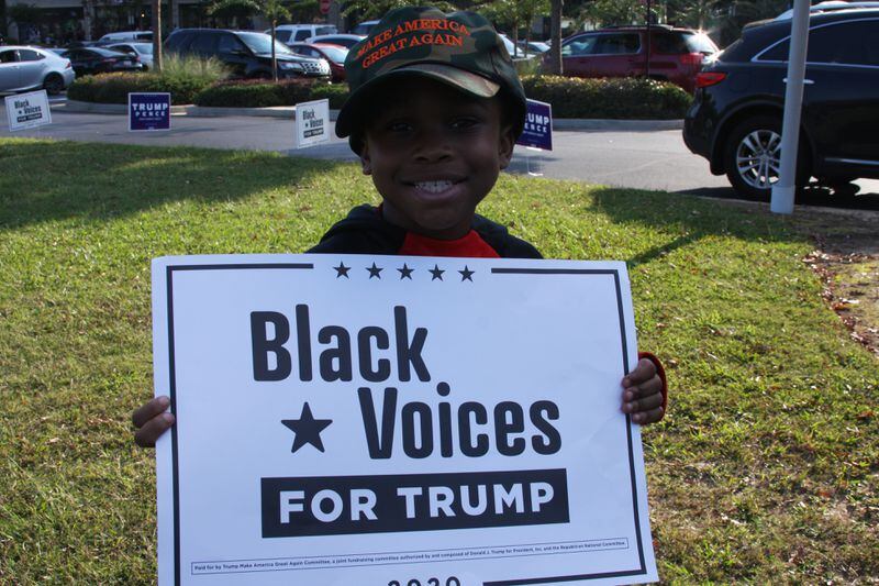 Gabriel McGee, 8, attended a recent Black Voices for Trump event with his mother.
