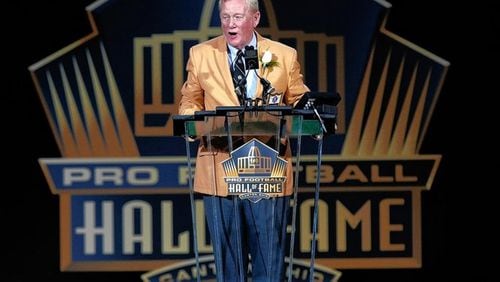 Bill Polian, a former executive with the Buffalo, Bills, Carolina Panthers and Indianapolis Colts, delivers his speech at the Pro Football Hall of Fame inductions Saturday, Aug. 8, 2015, in Canton, Ohio. (AP Photo/Tom E. Puskar)