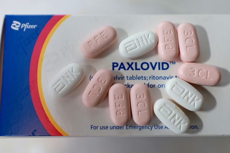 In this photo illustration, Pfizer's Paxlovid is displayed on July 7, 2022, in Pembroke Pines, Florida. (Joe Raedle/Getty Images/TNS)