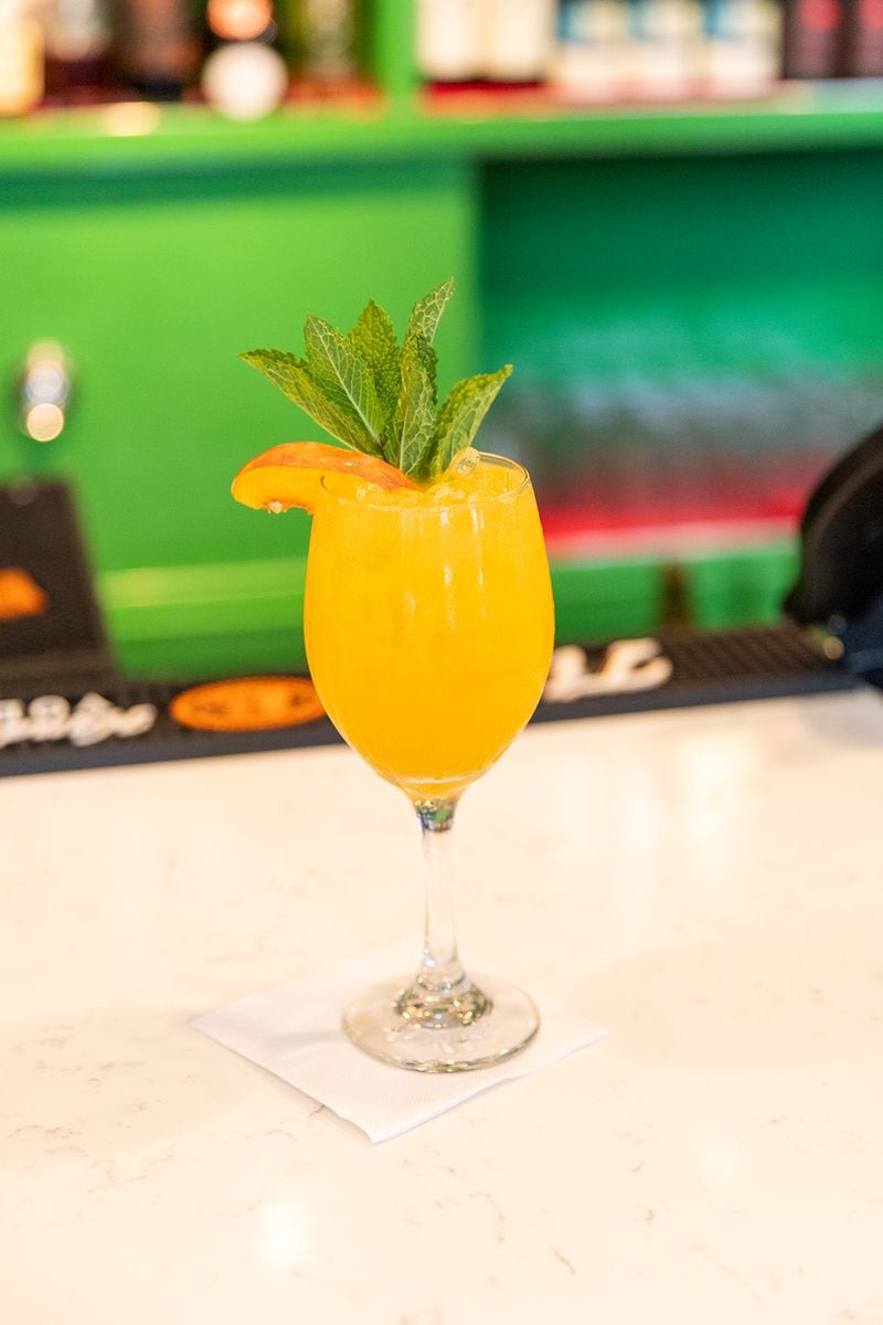 Joy Cafe's Georgia Fizz carries the flavors and aromas of peach, orange blossom and elderflower in cava bubbles. Courtesy of Atlys Media