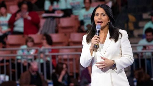 New rules announced for the March 15 Democratic debate will allow former Vice President Joe Biden and Vermont Sen. Bernie Sanders to participate but will likely exclude Hawaii Rep. Tulsi Gabbard.
