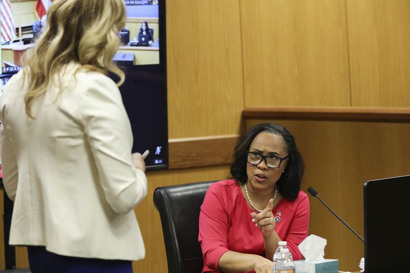 Fulton County District Attorney Fani Willis testifies during a hearing in the case of the State of Georgia v. Donald John Trump at the Fulton County Courthouse on Thursday, Feb. 15, 2024, in Atlanta. Judge Scott McAfee is hearing testimony as to whether Willis and Special Prosecutor Nathan Wade should be disqualified from the case for allegedly lying about a personal relationship. (Alyssa Pointer/Pool/Getty Images/TNS)