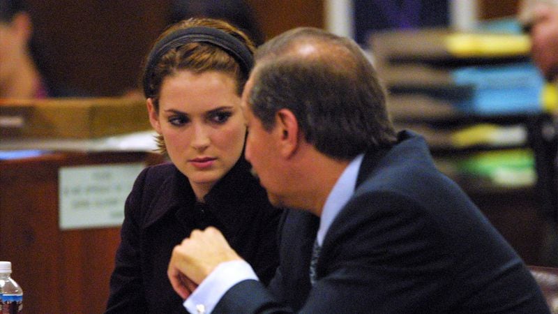 Winona Ryder listens as the verdict is read at the Beverly Hills Municipal Court on the eighth day of her shoplifting trial on November 6, 2002 in Beverly Hills, California. She  was found not guilty of burglary  charges, guilty of vandalism and felony grand theft charges stemming from her shoplifting arrest December 12, 2001 at a Saks Fifth Avenue store in Beverly Hills.