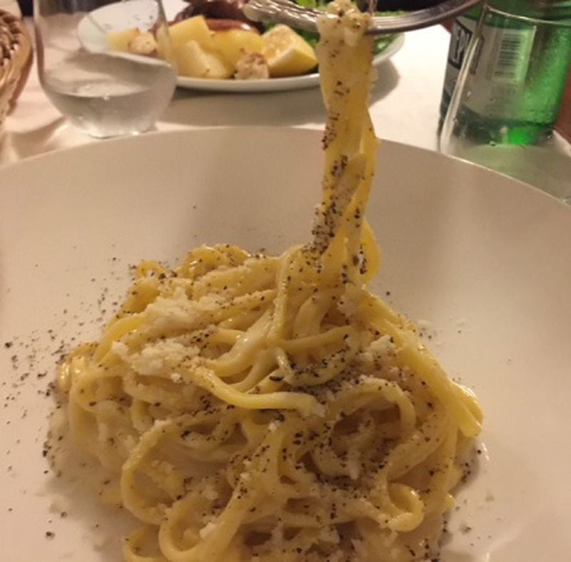 Cacio de pepe, Rome's beloved dish, is simply parmesan and usually a little pecorino and lots of black pepper tossed with hot pasta and sometimes a little starchy pasta water. (Kathleen Purvis/Charlotte Observer/TNS)
