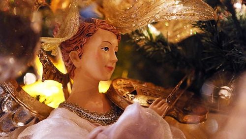 An angel themed ornament on the "Angel tree" in the family room of the Joyce  Zerges household in this AJC file photo from Nov. 11, 2014. She has had parts of her house professionally decorated for Christmas and has worked with the decorators and others at M.C Twinklin's Christmas shop.