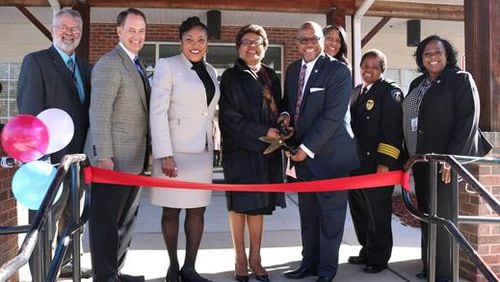(from left) Fulton County Senior Services Division Manager Kenn Vanhoose, Fulton County Manager Dick Anderson, Union City Councilwoman Christina Hobbs, Fulton County District 6 Commissioner Emma Darnell, Union City Mayor Vince Williams, District 4 Commissioner Natalie Hall, Union City Police Chief Cassandra Jones and Union City Manager Sonja Fillingame