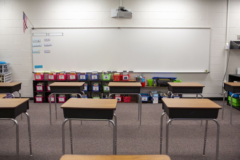 Desks are seen socially distanced in Northbrook Middle School in Suwanee, Georgia, on Wednesday, July 8, 2020. Schools in Georgia have been closed since March due to the coronavirus pandemic. (REBECCA WRIGHT / FOR THE AJC)