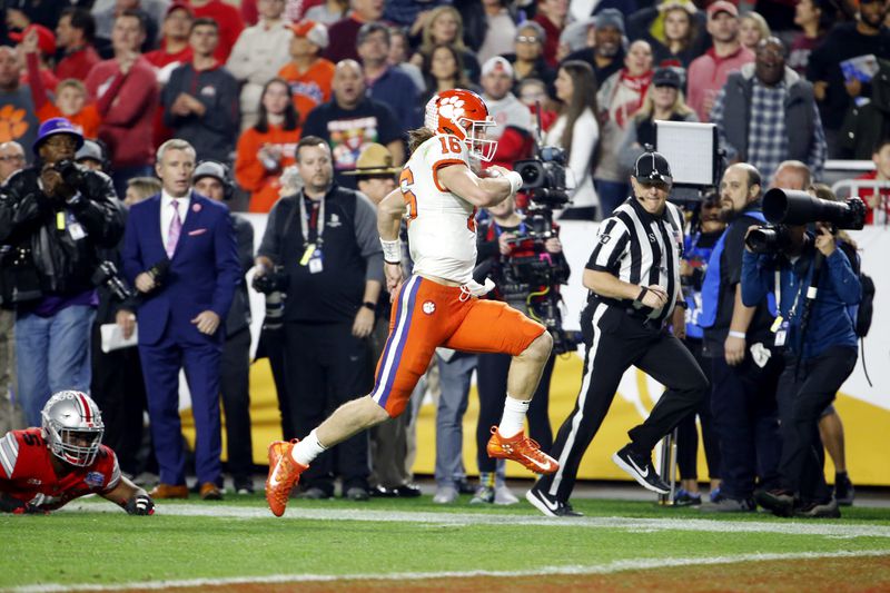 Trevor Lawrence of the Clemson Tigers runs for a 67-yard touchdown. (Photo by Ralph Freso/Getty Images)